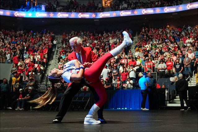 Gary Bruce and Brittany Kemper dance before Republican presidential nominee former President Donald Trump speaks at a Turning Point Action campaign rally, Wednesday, October 23, 2024, in Duluth, Ga. (Photo by Alex Brandon/AP Photo)