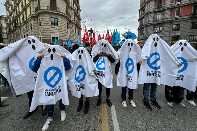 Demonstrators dressed as ghosts with a slogan that reads “No to ghost workers” during a general strike in Naples, Italy, 29 November 2024. The Italian General Confederation of Labour (CGIL) and the Italian Union of Labour (UIL) called for a nationwide strike against the government's budget proposal, an increase in wages and pensions, financing health, education, and public services, and investing in industrial policies. (Photo by Cesare Abbate/EPA/EFE)