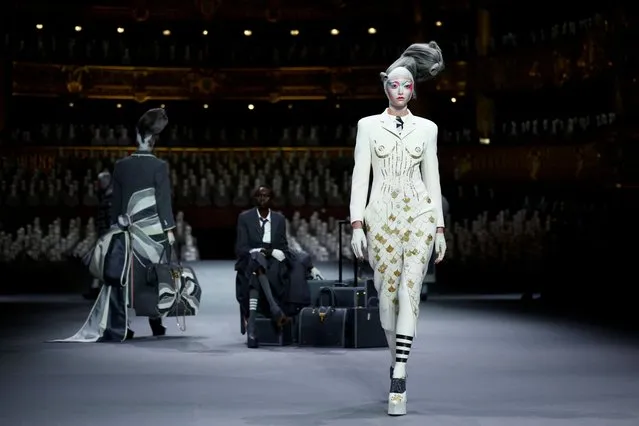 Models present creations by designer Thom Browne as part of his Haute Couture Fall/Winter 2023-2024 collection show at the Opera Garnier in Paris, France on July 3, 2023. (Photo by Sarah Meyssonnier/Reuters)