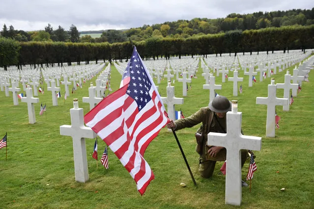 A man in WWI military uniform poses at the Meuse-Argonne American Cemetery, northeastern France, during a remembrance ceremony, on Sunday. September 23, 2018. A remembrance ceremony is taking place Sunday for the 1918 Meuse-Argonne offensive, America's deadliest battle ever that cost 26,000 lives but helped bring an end to World War 1. (Photo by Julien de Rosa/AP Images for WW1 Centennial)