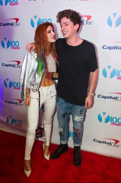 Bella Thorne, left, and Charlie Puth attend the Y100's iHeartRadio Jingle Ball 2016 at BB&T Center on Sunday, December 18, 2016, in Sunrise, Fla. (Photo by Amy Harris/Invision/AP Photo)
