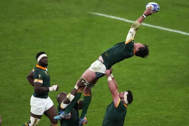 South Africa's Franco Mostert catches the ball during the Rugby World Cup quarterfinal match between France and South Africa at the Stade de France in Saint-Denis, near Paris, Sunday, October 15, 2023. (Photo by Themba Hadebe/AP Photo)