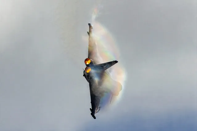 RAF Eurofighter Typhoon FGR4 kicks up a rainbow of smoke in Blackpool, England on Sunday, August 13th 2023. The Typhoon FGR is a highly capable and extremely agile multi-role combat aircraft capable of being deployed for the full spectrum of air operations including air policing, peace support and high intensity conflict. (Photo by James Poole/Media Drum Images)