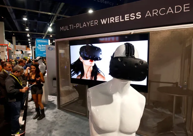 Australian-based Immersive Robotics promotes their multi-player wireless VR streaming system during the 2017 CES in Las Vegas, Nevada, U.S., January 6, 2017. The company is trying to create a compression standard for VR content, a representative says. (Photo by Steve Marcus/Reuters)