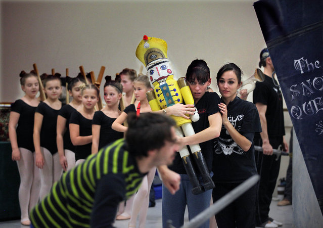 Milwaukee Ballet company dancers rehearse a fight scene with with students at the Milwaukee Ballet School and Academy joining and watching  during a rehearsal Tuesday, December 3, 2013 for “The Nutcracker”, which will be from December 14-27th at the Marcus Center. (Photo by Rick Wood)
