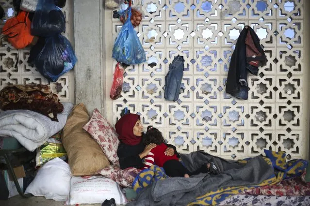 Palestinians take shelter from the Israeli bombardment of the Gaza Strip in the Gaza European Hospital in Khan Younis, Tuesday, December 26, 2023. (Photo by Hatem Ali/AP Photo)