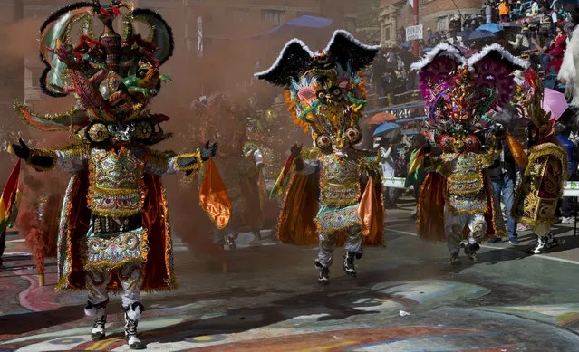 Dancers perform the traditional “Diablada” or Dance of the Devils during the Carnival in Oruro, Bolivia, Saturday, March 2, 2019. (Photo by Juan Karita/AP Photo)