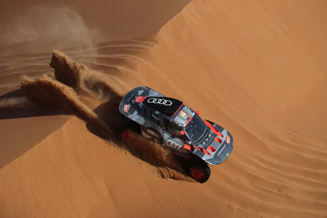 Team Audi Sport's Mattias Ekstrom and co-driver Emil Bergkvist in action during stage 6 in Saudi Arabia on January 11, 2024. (Photo by Hamad I Mohammed/Reuters)