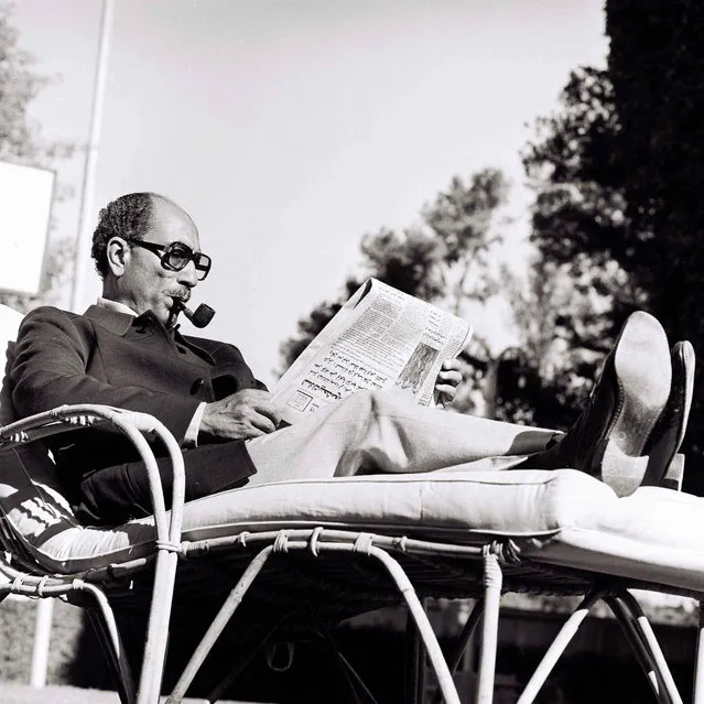 President Sadat reads daily newspapers at home in Giza, 1978. Ibrahim caused a stir in Egypt with an intimate series on Anwar Sadat, including images of him in his underwear and shaving. (Photo by Farouk Ibrahim)