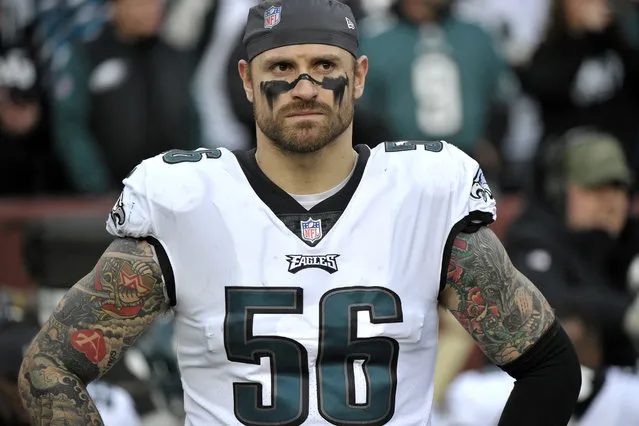 In this December 30, 2018, file photo, Philadelphia Eagles defensive end Chris Long stands on the sideline prior to the team's NFL football game against the Washington Redskins in Landover, Md. Long has announced his retirement from football, ending an 11-year NFL playing career that included winning two Super Bowl titles and the Walter Payton Man of the Year Award. Long posted his decision Saturday night, May 18, on Twitter, saying it has "been a hell of a journey" and adds that “I can honestly say I put my soul into every minute of it”. (Photo by Mark Tenally/AP Photo/File)