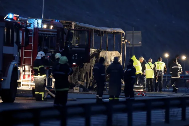 A view shows the site where a bus with North Macedonian plates caught fire on a highway, near the village of Bosnek, in Bulgaria, November 23, 2021. (Photo by Stoyan Nenov/Reuters)