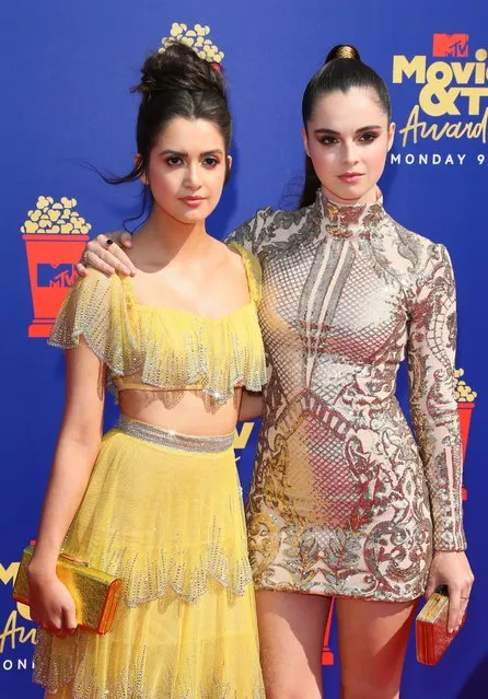 US actresses Vanessa Marano (R) and Laura Marano arrive for the 2019 MTV Movie & TV Awards at the Barker Hangar in Santa Monica on June 15, 2019. - The 2019 MTV Movie & TV Awards will air on June 17. (Photo by Jean-Baptiste Lacroix/AFP Photo)