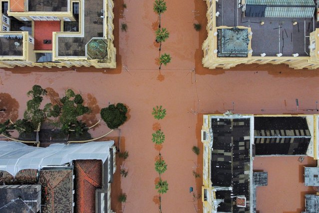 A drone view shows a flooded city center after people were evacuated in Porto Alegre, in Rio Grande do Sul, Brazil, on May 4, 2024. (Photo by Renan Mattos/Reuters)