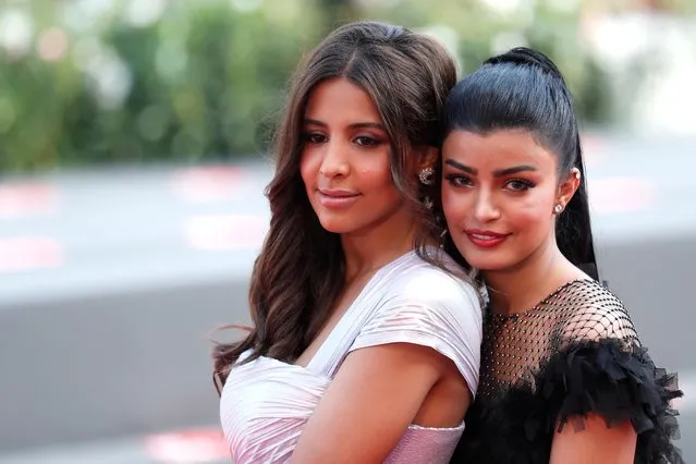 Dhay and Mila Al Zahrani pose before the screening of the film “The Perfect Candidate” during the 76th Venice Film Festival at Sala Grande on August 29, 2019 in Venice, Italy. (Photo by Yara Nardi/Reuters)