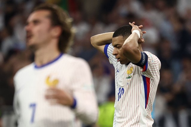 France's forward #10 Kylian Mbappe reacts after failing to score during the UEFA Euro 2024 semi-final football match between Spain and France at the Munich Football Arena in Munich on July 9, 2024. (Photo by Franck Fife/AFP Photo)