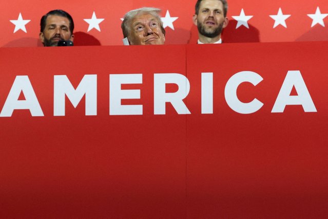 Republican presidential nominee and former U.S. President Donald Trump, Donald Trump Jr. and Eric Trump attend Day 1 of the Republican National Convention (RNC) at the Fiserv Forum in Milwaukee, Wisconsin on July 15, 2024. (Photo by Andrew Kelly/Reuters)