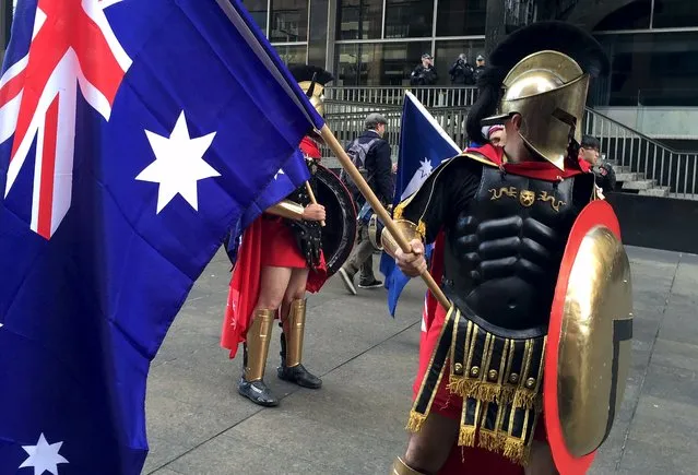 Protesters dressed in costume and carrying Australian flags attend a “Reclaim Australia” protest in central Sydney, Australia, July 19, 2015. Anti-racist and nationalist protesters held demonstrations in several Australian cities and towns on Sunday, with the two sides being seperated by police, local media reported. (Photo by Baris Atayman/Reuters)