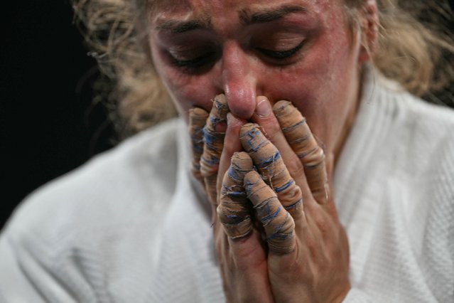 Serbia's Marica Perisic reacts after loosing to Japan's Haruka Funakubo in the judo women's -57kg repechage bout of the Paris 2024 Olympic Games at the Champ-de-Mars Arena, in Paris on July 29, 2024. (Photo by Luis Robayo/AFP Photo)