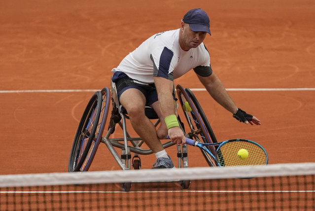 Israel's Adam Berdichevsky returns the ball to Italy's Luca Arca during their 2024 Paralympics men's Wheelchair singles tennis tournament first round match at Roland Garros Stadium in Paris, France, Friday August 30, 2024. (Photo by Michel Euler/AP Photo)