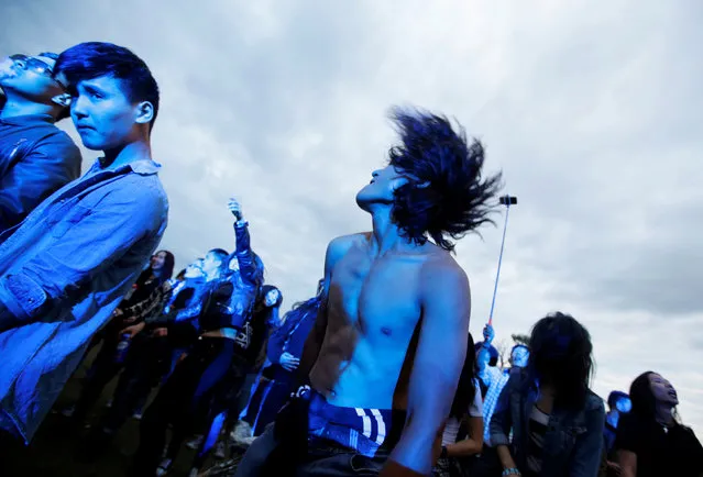 Revellers attend the Play Time 2016 music festival on the outskirts of Ulaanbaatar, Mongolia, June 26, 2016. (Photo by Jason Lee/Reuters)