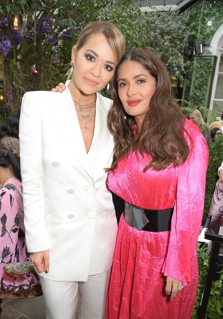 Rita Ora (L) and Salma Hayek Pinault attend International Women's Day for The Caring Foundation with Salma Hayek at Annabel's on March 08, 2020 in London, England. (Photo by David M. Benett/Dave Benett/Getty Images for Annabel's)