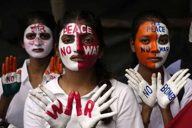 Students participate in a peace rally to mark the anniversary of World War II atomic bombing of Hiroshima and Nagasaki in Mumbai, India, Saturday, August 6, 2022. (Photo by Rajanish Kakade/AP Photo)