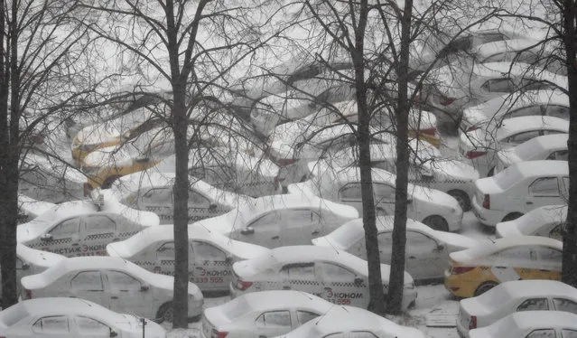 A view of a full parking of rental cars in Podolsk, Russia, 31 March 2020. Russian authorities imposed a week long home quarantine to prevent the spread of the coronavirus SARS-CoV-2 which causes the COVID-19 disease. (Photo by Maxim Shipenkov/EPA/EFE)