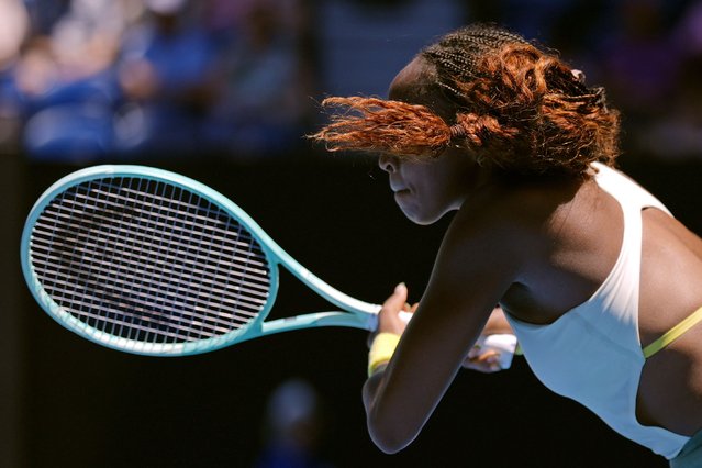 Coco Gauff of the U.S. plays a backhand return to Sofia Kenin of the U.S. during their first round match at the Australian Open tennis championship in Melbourne, Australia, Monday, January 13, 2025. (Photo by Asanka Brendon Ratnayake/AP Photo)