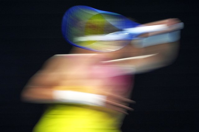 Ben Shelton of the U.S. plays a backhand return to Jannik Sinner of Italy during their semifinal match at the Australian Open tennis championship in Melbourne, Australia, Friday, January 24, 2025. (Photo by Asanka Brendon Ratnayake/AP Photo)