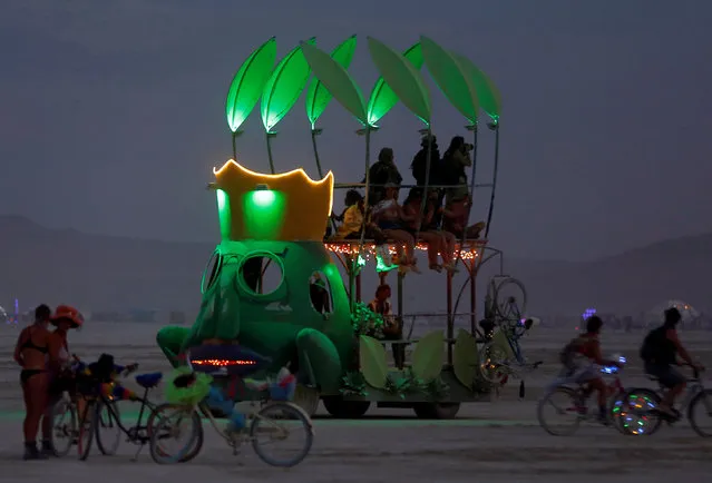 A mutant vehicle drives on the Playa as approximately 70,000 people from all over the world gather for the 30th annual Burning Man arts and music festival in the Black Rock Desert of Nevada, U.S. September 1, 2016. (Photo by Jim Urquhart/Reuters)