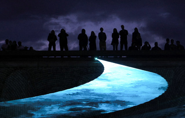 The National Palace of Culture's underpass is illuminated by the light installation called “Cosmic Echos”, as part of the “Lunar” Festival of Lights in Sofia, Bulgaria, on May 9, 2025. (Photo by Spasiyana Sergieva/Reuters)