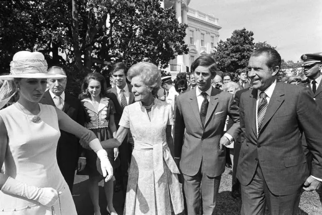  First lady Pat Nixon leads Princess Anne Thursday, July 16, 1970, from welcoming ceremonies at the White House. President Richard Nixon and Prince Charles walk with them. In the background are Julie and David Eisenhower. (Photo by AP Photo, File)