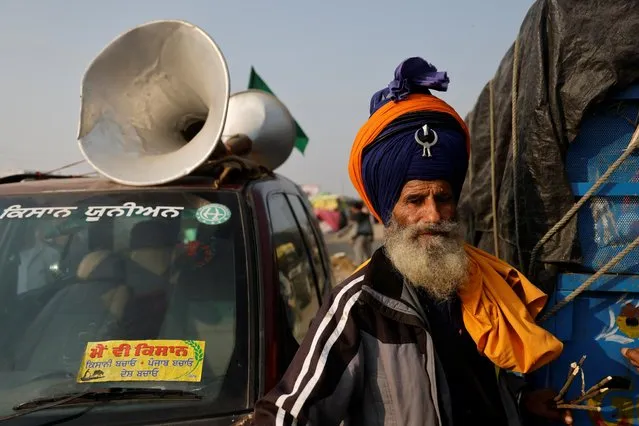A farmer attends a protest against the newly passed farm bills at Singhu border near Delhi, India, November 30, 2020. (Photo by Danish Siddiqui/Reuters)