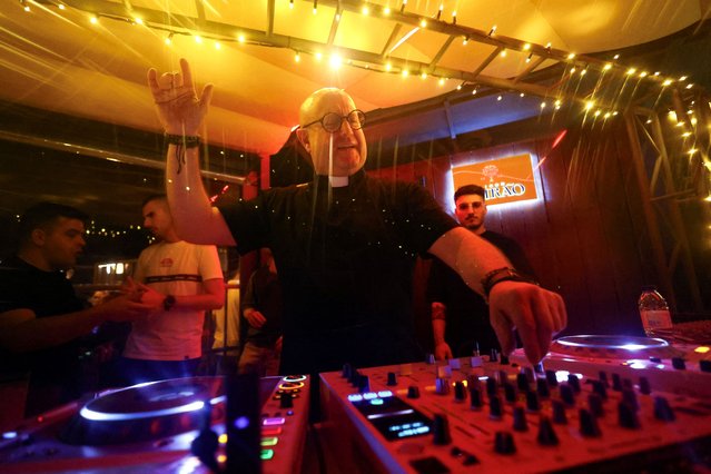 DJ priest Guilherme plays music in the parish bar of Laundos, Povoa do Varzim, Portugal, on July 13, 2024. (Photo by Pedro Nunes/Reuters)