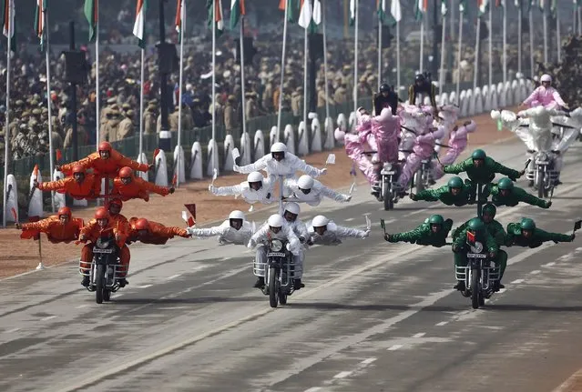 India's Border Security Force (BSF) “Daredevils” motorcycle riders take part in a full dress rehearsal for the Republic Day parade in New Delhi January 23, 2015. (Photo by Adnan Abidi/Reuters)