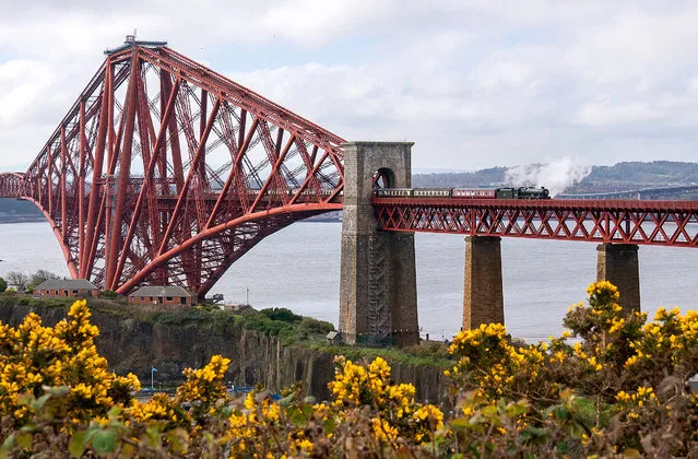 Jubilee Class steam locomotive 45596 Bahamas crosses the Forth Bridge on its way from Edinburgh Waverley to Aberdeen on a day trip operated by The Railway Touring Company on Wednesday, April 19, 2023. (Photo by Jane Barlow/PA Images via Getty Images)