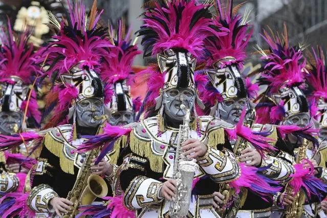 Members of the Frailnger String Band perform during the 116th annual Mummers Parade in Philadelphia on Friday, January 1, 2016. (Photo by Joseph Kaczmarek/AP Photo)
