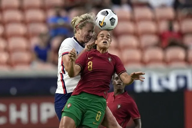 Portugal's Andreia Norton (8) and United States' Lindsey Horan go up for a header during the first half of a friendly soccer match Thursday, June 10, 2021, in Houston. (Photo by David J. Phillip/AP Photo)