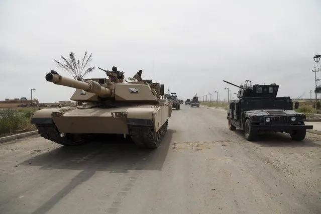 Iraqi security forces deploy in Tikrit, 80 miles (130 kilometers) north of Baghdad, Iraq, Wednesday, April 1, 2015. (Photo by Khalid Mohammed/AP Photo)