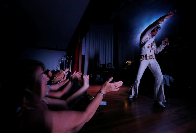 Elvis Presley tribute performer Pete Storm from London dances on stage during the 25th annual Parkes Elvis Festival in the rural Australian town of Parkes, west of Sydney, Australia January 13, 2017. (Photo by Jason Reed/Reuters)