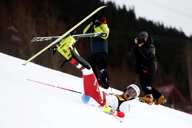 Switzerland's Daniel Yule falls as he competes in the first run of the men's slalom event at the 2019 FIS Alpine Ski World Championships at the National Arena in Are, Sweden, on February 17, 2019. (Photo by Christian Hartmann/Reuters)