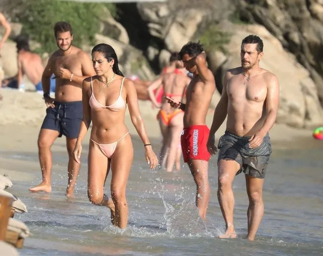 The American actor James Franco and his sеxy bikini-clad girlfriend Isabel Pakzad relax at Branco beach on their sun-soaked holiday in Mykonos, Greece on September 6, 2021. (Photo by Backgrid USA)