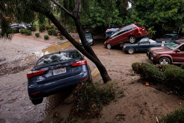 Damage is shown after a heavy rain storm causes a small river to overflow into a neighborhood in San Diego, California, U.S. January 22, 2024. (Photo by Mike Blake/Reuters)