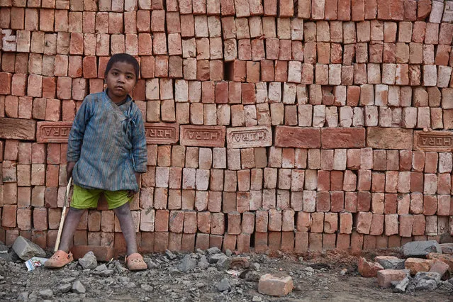 Workers seen at a brick kilns in Kathmandu Valley, Nepal. (Photo by Jan Moeller Hansen/Barcroft Images)