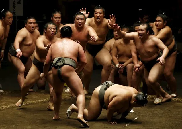 Sumo wrestlers of Nishonoseki clan appeal to the winner of a training bout for the next opponent during a joint training session ahead of the May Grand Sumo Tournament in Tokyo May 2, 2015. (Photo by Toru Hanai/Reuters)