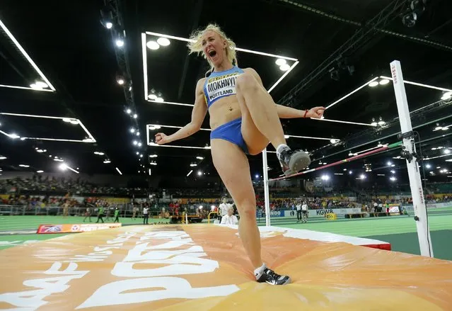 Anastasiya Mokhnyuk of Ukraine celebrates a jump in the high jump portion of the women's pentathlon during the IAAF World Indoor Athletics Championships in Portland, Oregon March 18, 2016. (Photo by Mike Blake/Reuters)