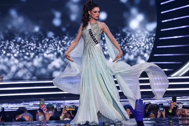 Miss Paraguay, Nadia Ferreira, presents herself on stage during the preliminary stage of the 70th Miss Universe beauty pageant in Israel's southern Red Sea coastal city of Eilat on December 10, 2021. (Photo by Menahem Kahana/AFP Photo)