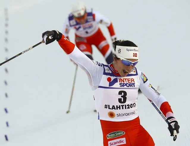 Norwegian Marit Bjoergen celebrates after winning the ladies' cross- country 30 km freestyle skiing competition in the FIS Nordic World Ski Championships in Lahti, Finland, on March 4, 2017. (Photo by Kai Pfaffenbach/Reuters)