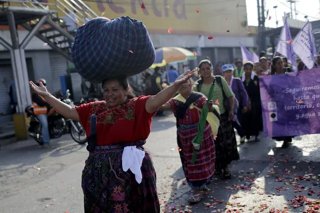 Indigenous people take part in a protest to demand control over water resources in provincial areas, which according to the protesters have become polluted and increasingly scarce, in Guatemala City, Guatemala, April 22, 2016. (Photo by Saul Martinez/Reuters)