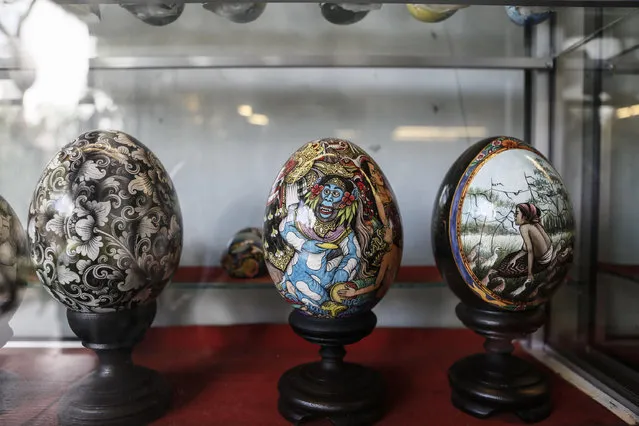 Painted eggshell displayed at Wayan Sadra's workshop on April 14, 2014 in Sukawati, Gianyar, Bali, Indonesia. (Photo by Putu Sayoga/Getty Images)